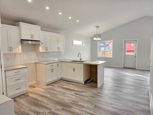 9211 94A Avenue, Wembley, AB - Indoor Photo Showing Kitchen With Double Sink
