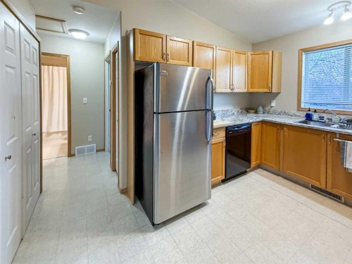 9002 63 Avenue, Grande Prairie, AB - Indoor Photo Showing Kitchen With Double Sink