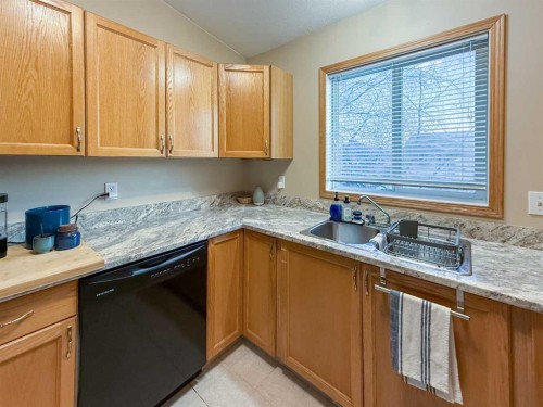 9002 63 Avenue, Grande Prairie, AB - Indoor Photo Showing Kitchen With Double Sink