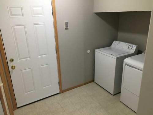 9002 63 Avenue, Grande Prairie, AB - Indoor Photo Showing Laundry Room