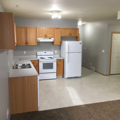9002 63 Avenue, Grande Prairie, AB - Indoor Photo Showing Kitchen With Double Sink