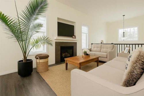 8543 69 Avenue, Grande Prairie, AB - Indoor Photo Showing Living Room With Fireplace