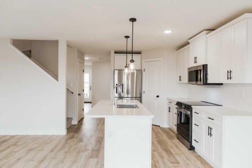 11421 95 Street, Clairmont, AB - Indoor Photo Showing Kitchen With Stainless Steel Kitchen With Double Sink With Upgraded Kitchen