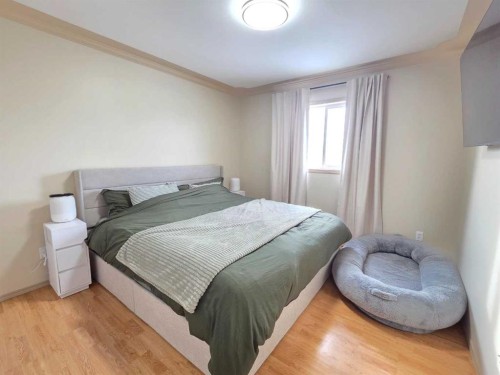 58 Pinnacle Crossing, Grande Prairie, AB - Indoor Photo Showing Bedroom