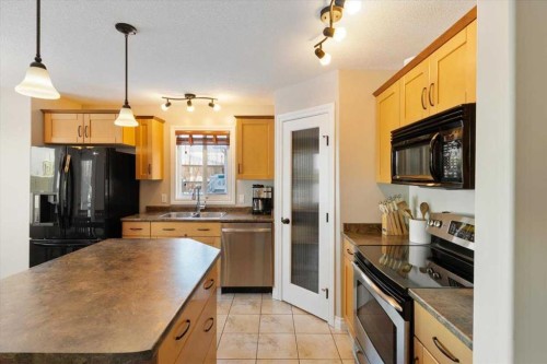 11102 67 Avenue, Grande Prairie, AB - Indoor Photo Showing Kitchen With Double Sink