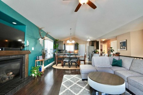 9122 130 Avenue, Peace River, AB - Indoor Photo Showing Living Room With Fireplace