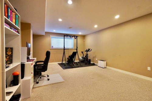 9122 130 Avenue, Peace River, AB - Indoor Photo Showing Gym Room
