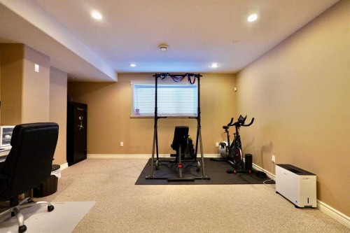 9122 130 Avenue, Peace River, AB - Indoor Photo Showing Gym Room