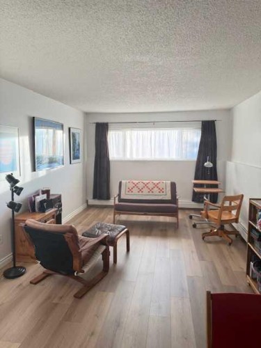 106-11114 Hoppe, Grande Cache, AB - Indoor Photo Showing Living Room With Fireplace