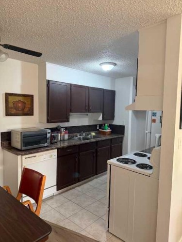 106-11114 Hoppe, Grande Cache, AB - Indoor Photo Showing Kitchen