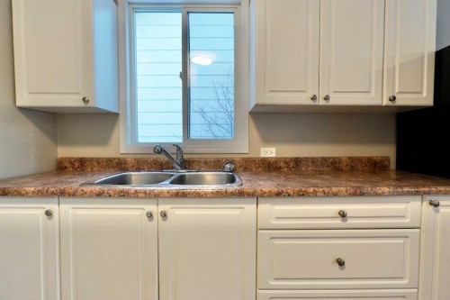 10509 101 Street, Peace River, AB - Indoor Photo Showing Kitchen With Double Sink