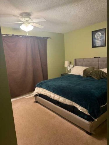 11510 Manning, Grande Cache, AB - Indoor Photo Showing Bedroom