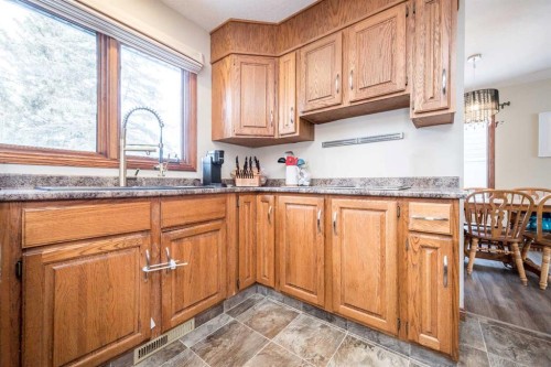 9818 75 Avenue, Grande Prairie, AB - Indoor Photo Showing Kitchen With Double Sink
