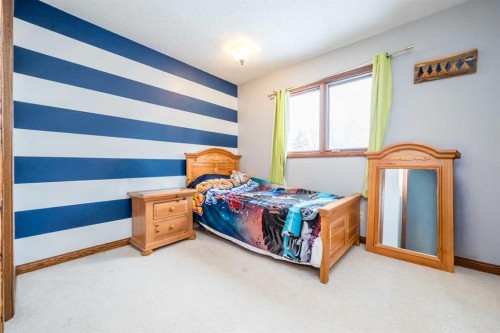 9818 75 Avenue, Grande Prairie, AB - Indoor Photo Showing Bedroom