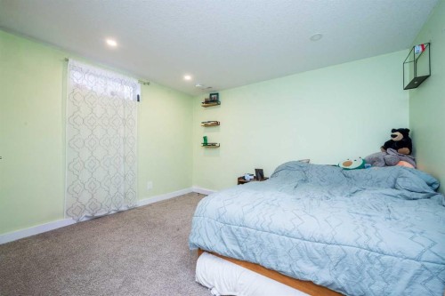 9818 75 Avenue, Grande Prairie, AB - Indoor Photo Showing Bedroom