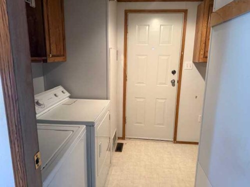 221 Mawdsley, Grande Cache, AB - Indoor Photo Showing Laundry Room