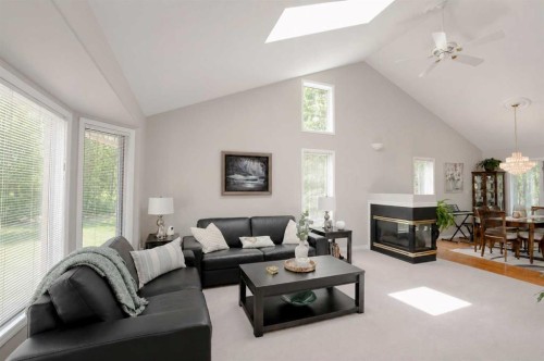 711044 Range Road 55, Grande Prairie, AB - Indoor Photo Showing Living Room With Fireplace