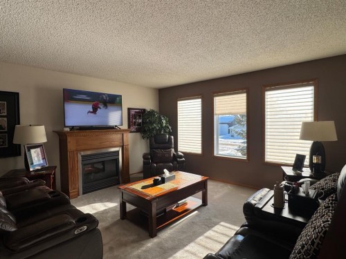 11608 106 Avenue, Fairview, AB - Indoor Photo Showing Living Room With Fireplace