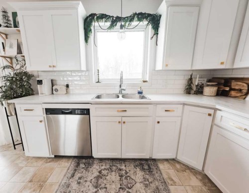 9606 107, La Crete, AB - Indoor Photo Showing Kitchen With Double Sink