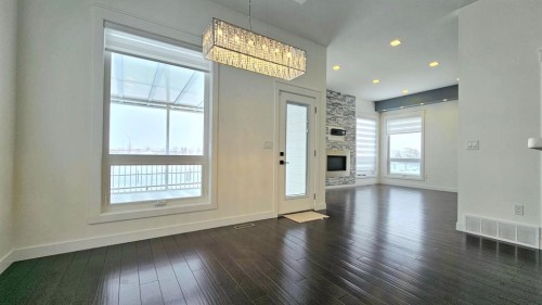 6530 Grand Banks Drive, Grande Prairie, AB - Indoor Photo Showing Other Room With Fireplace