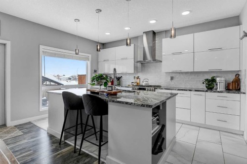 8614 88 Street, Grande Prairie, AB - Indoor Photo Showing Kitchen With Upgraded Kitchen