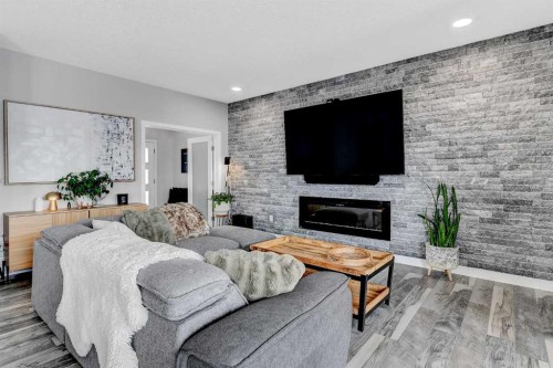 8614 88 Street, Grande Prairie, AB - Indoor Photo Showing Living Room With Fireplace
