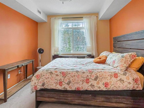 306-160 Moberly, Grande Cache, AB - Indoor Photo Showing Bedroom