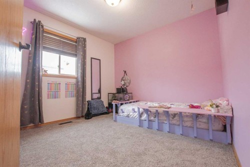 7610 106A Street, Grande Prairie, AB - Indoor Photo Showing Bedroom