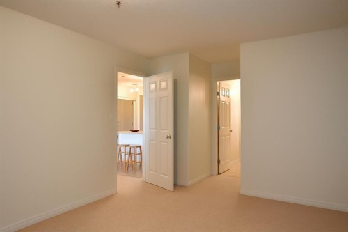 210-9810 96 Street, Grande Prairie, AB - Indoor Photo Showing Other Room