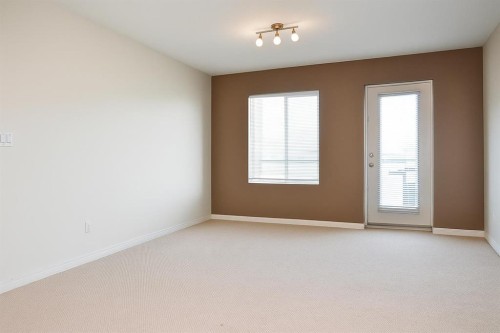 210-9810 96 Street, Grande Prairie, AB - Indoor Photo Showing Other Room