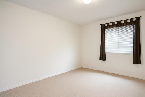 210-9810 96 Street, Grande Prairie, AB - Indoor Photo Showing Other Room