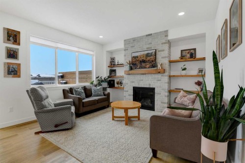 12018 83 Avenue, Grande Prairie, AB - Indoor Photo Showing Living Room With Fireplace