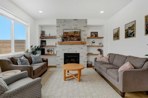 12018 83 Avenue, Grande Prairie, AB - Indoor Photo Showing Living Room With Fireplace