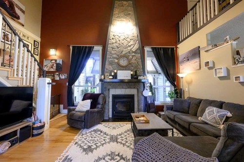 40-712009 Range Road 54 Range, Rural Grande Prairie No. 1, County Of, AB - Indoor Photo Showing Living Room With Fireplace
