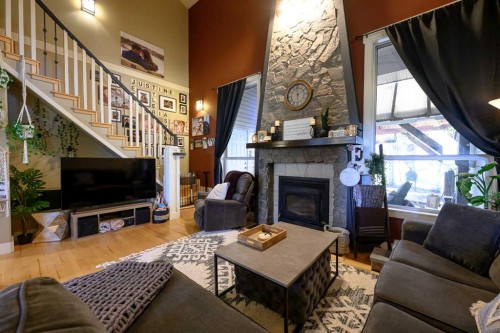 40-712009 Range Road 54 Range, Rural Grande Prairie No. 1, County Of, AB - Indoor Photo Showing Living Room With Fireplace