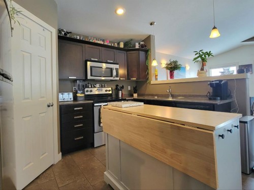 7418 115A Street, Grande Prairie, AB - Indoor Photo Showing Kitchen With Stainless Steel Kitchen