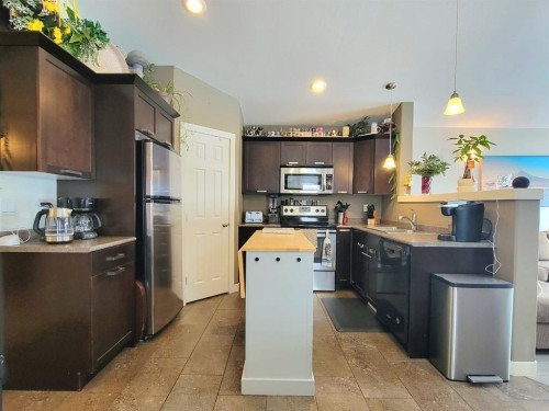 7418 115A Street, Grande Prairie, AB - Indoor Photo Showing Kitchen With Stainless Steel Kitchen