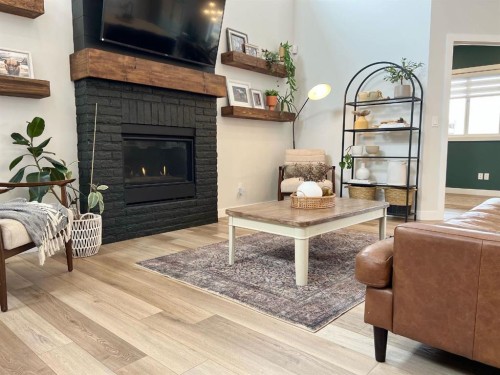 10718 152B Avenue, Rural Grande Prairie No. 1, County Of, AB - Indoor Photo Showing Living Room With Fireplace