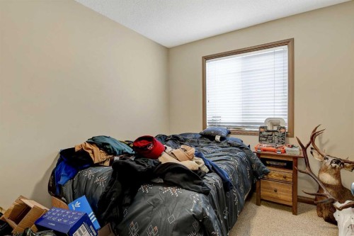 9033 93 Avenue, Grande Prairie, AB - Indoor Photo Showing Bedroom