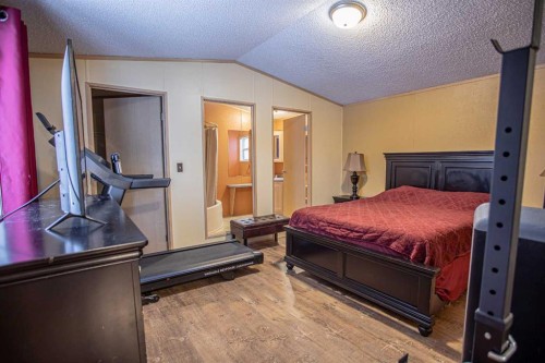 15 Dewberry Road, High Level, AB - Indoor Photo Showing Bedroom