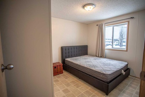 15 Dewberry Road, High Level, AB - Indoor Photo Showing Bedroom