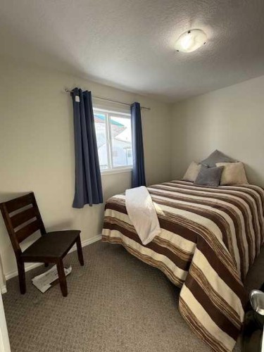 4 Boyer Close, High Level, AB - Indoor Photo Showing Bedroom