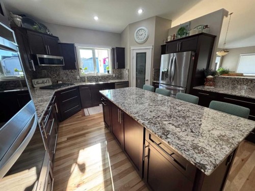 11111 99 Street, Peace River, AB - Indoor Photo Showing Kitchen With Stainless Steel Kitchen With Double Sink With Upgraded Kitchen