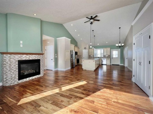 36-1049 Alberta Avenue, Debolt, AB - Indoor Photo Showing Living Room With Fireplace
