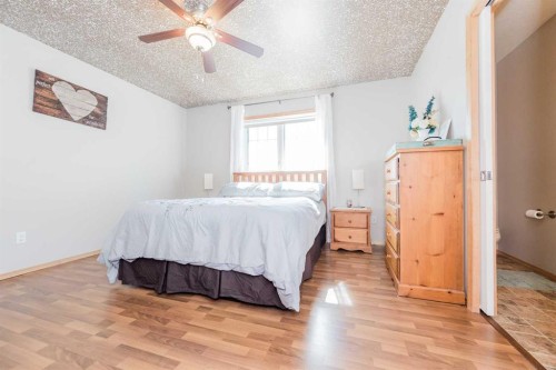 734082B Range Road 51, Sexsmith, AB - Indoor Photo Showing Bedroom