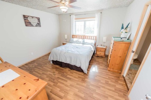 734082B Range Road 51, Sexsmith, AB - Indoor Photo Showing Bedroom