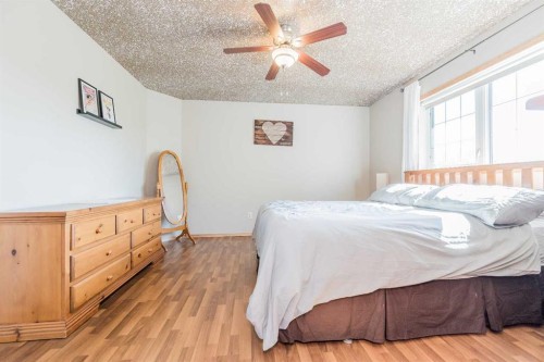 734082B Range Road 51, Sexsmith, AB - Indoor Photo Showing Bedroom