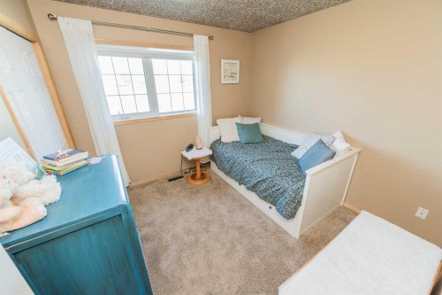 734082B Range Road 51, Sexsmith, AB - Indoor Photo Showing Bedroom