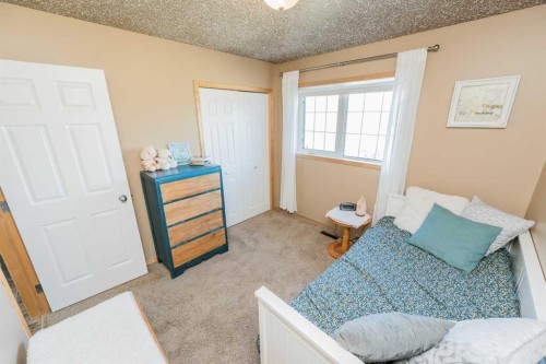 734082B Range Road 51, Sexsmith, AB - Indoor Photo Showing Bedroom