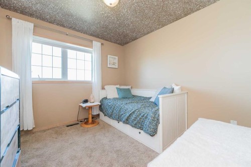 734082B Range Road 51, Sexsmith, AB - Indoor Photo Showing Bedroom